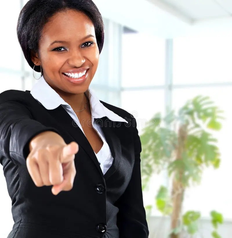 smiling-black-business-woman-pointing-29397165